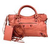 balenciaga-motocross-the-first-pink-agneau-leather-studded-city-tote-front