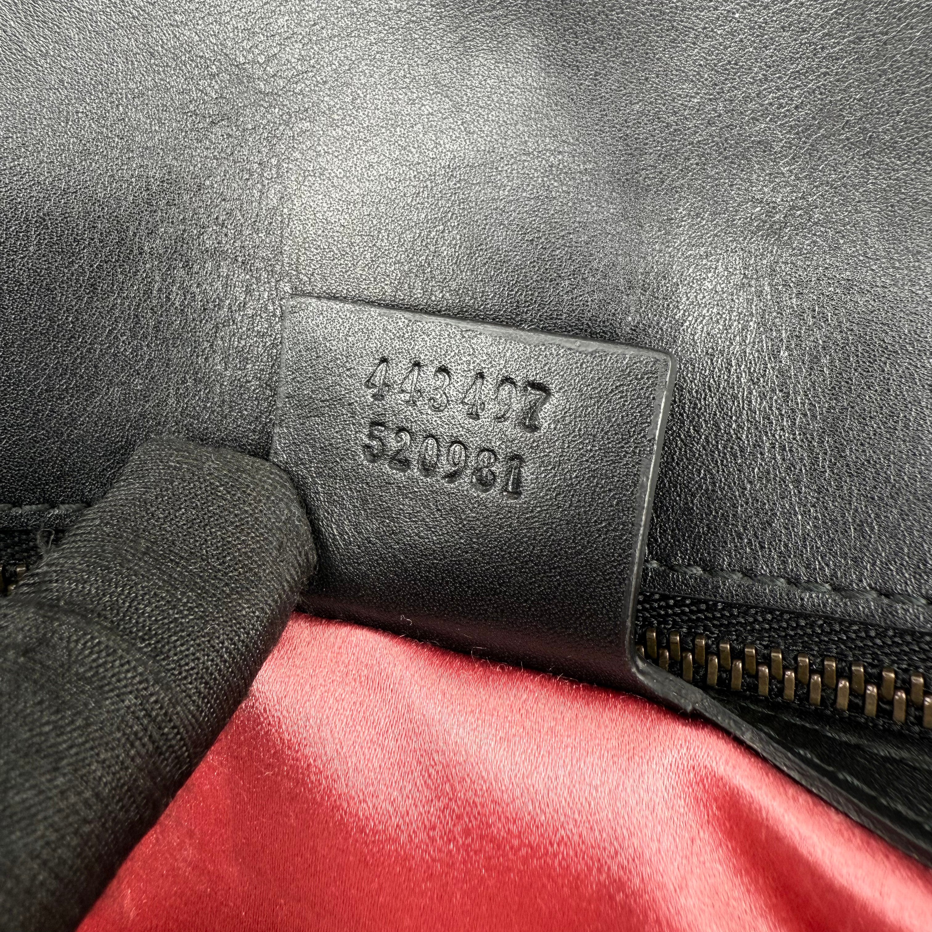 Gucci GG Marmont handbag in black and white quilted leather Gucci GG Marmont handbag in black and white quilted leather