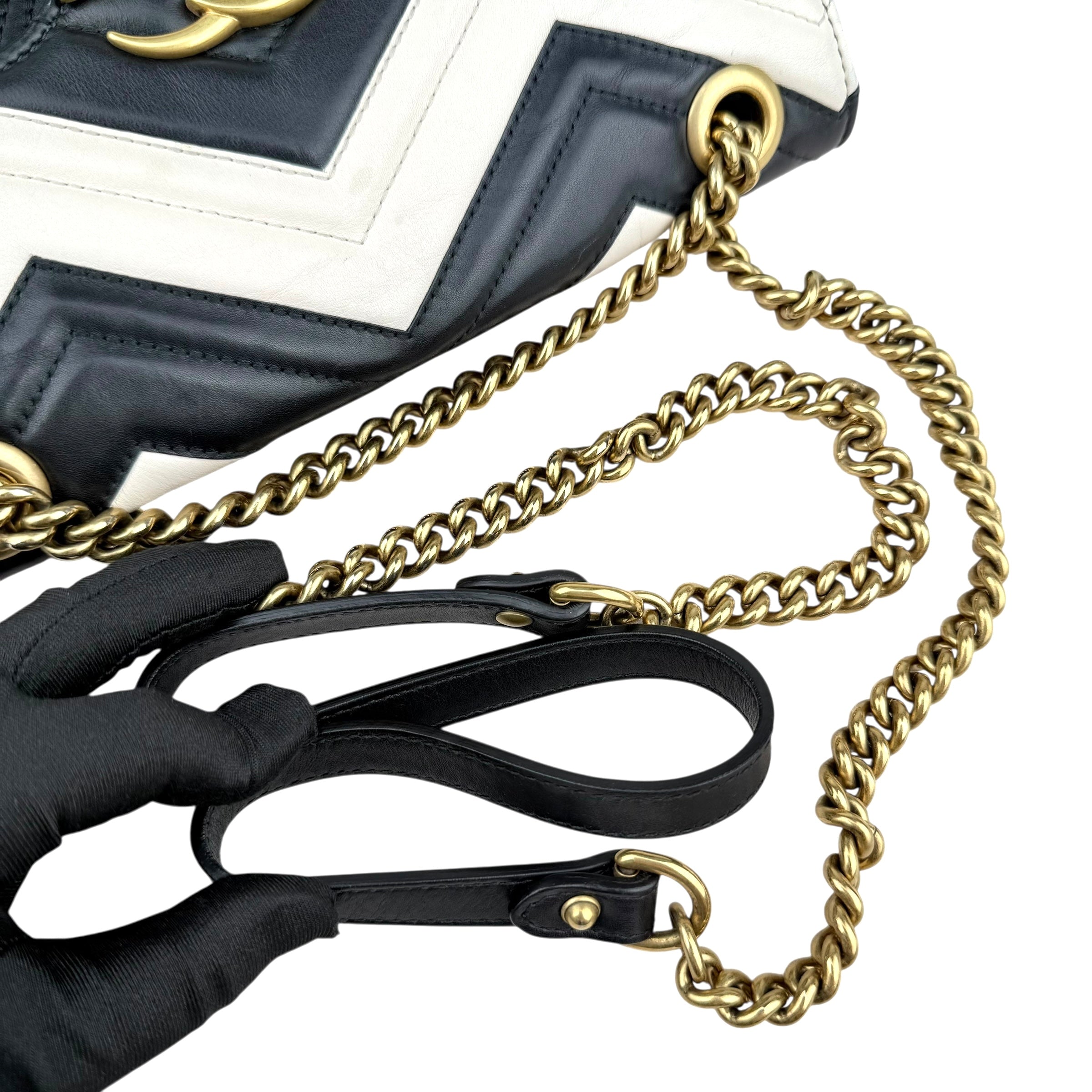 Gucci GG Marmont handbag in black and white quilted leather Gucci GG Marmont handbag in black and white quilted leather