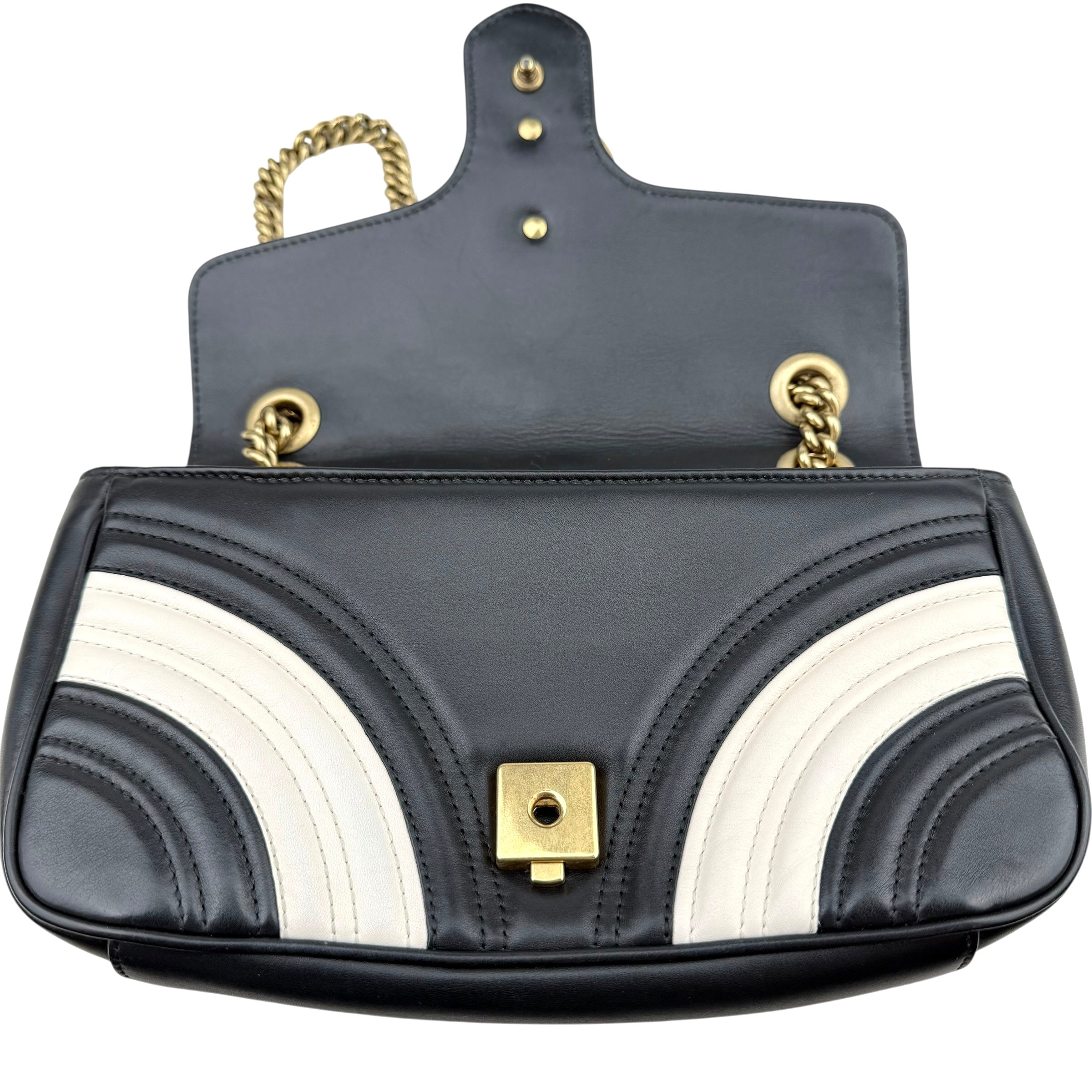 Gucci GG Marmont handbag in black and white quilted leather Gucci GG Marmont handbag in black and white quilted leather