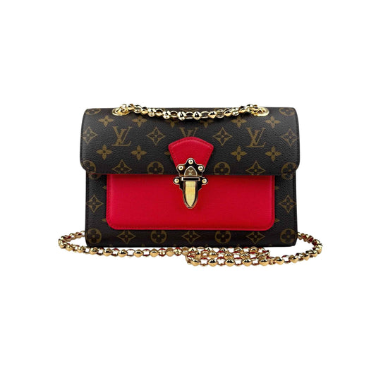 Louis Vuitton Victoire Handbag Monogram Canvas and Leather shoulder bag