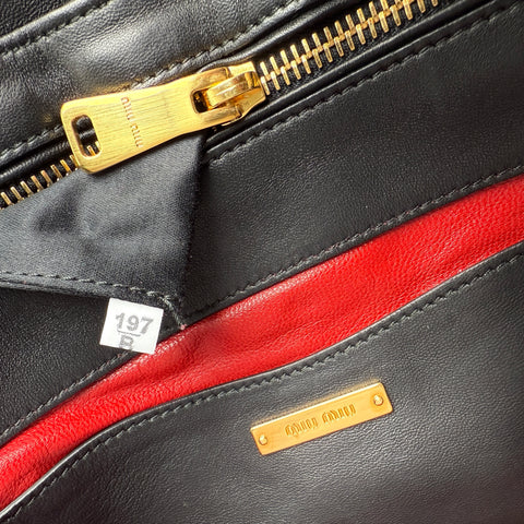 Pre-owned miu-miu-black-quilted-leather-biker-top-handle-bag-front