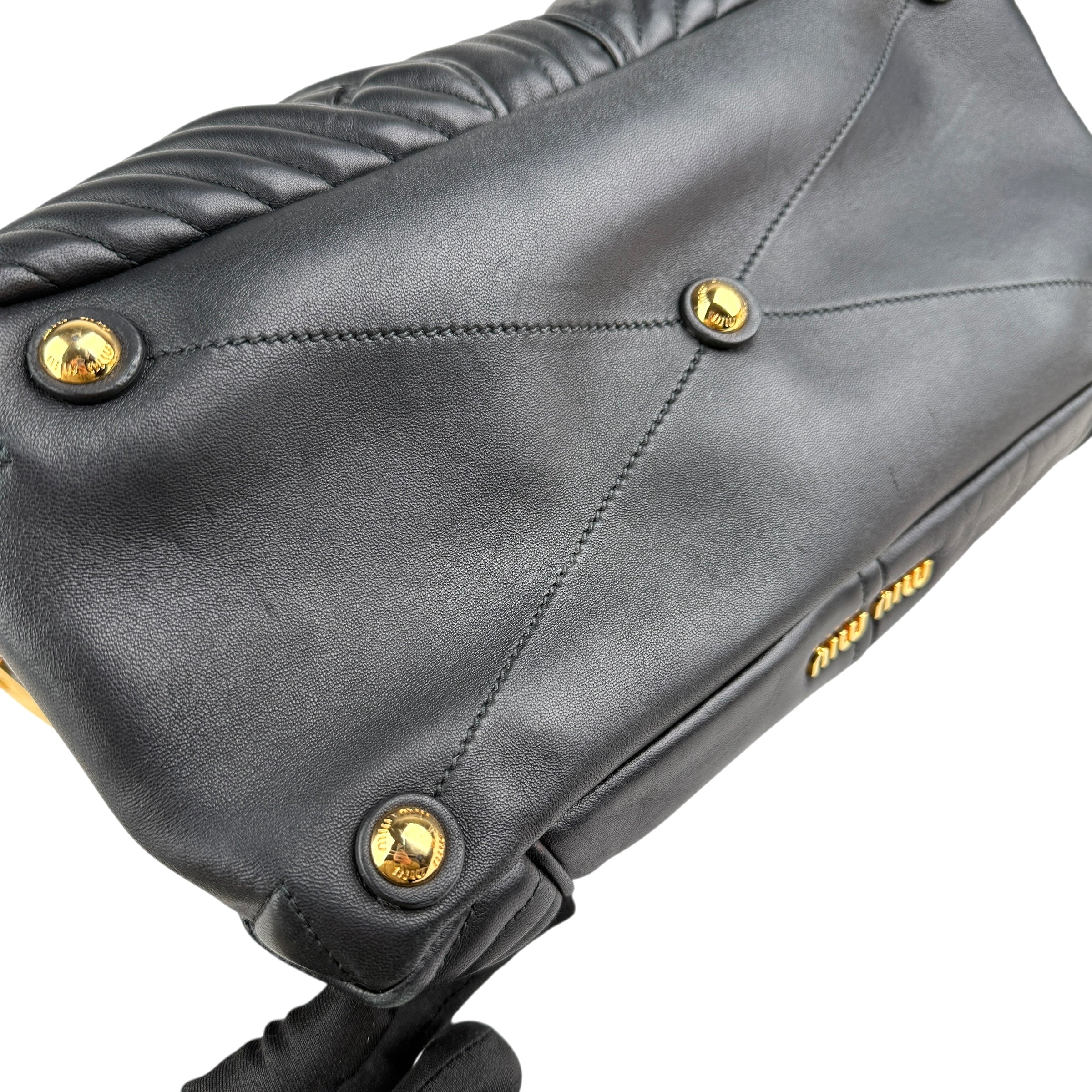 Pre-owned miu-miu-black-quilted-leather-biker-top-handle-bag-front