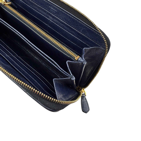 Prada calfskin zip around wallet