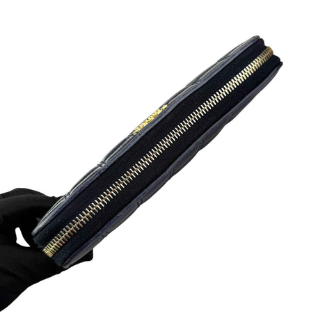 Prada calfskin zip around wallet