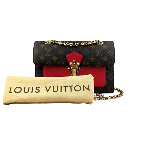 Louis Vuitton Victoire Handbag Monogram Canvas and Leather shoulder bag