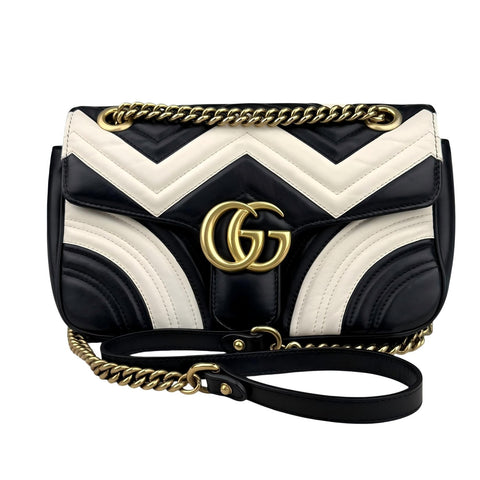 Gucci GG Marmont handbag in black and white quilted leather