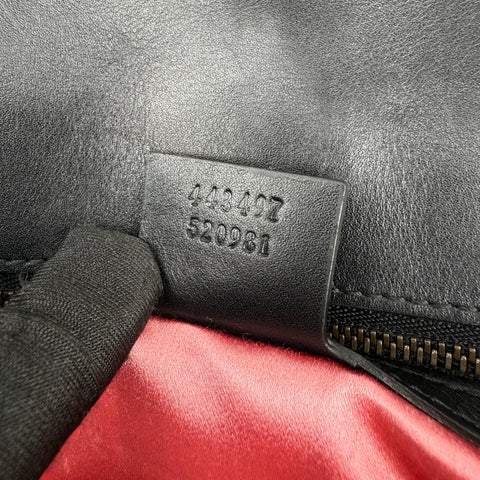 Gucci GG Marmont handbag in black and white quilted leather