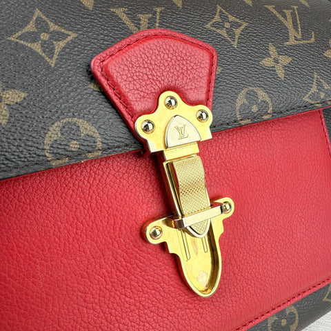 Louis Vuitton Victoire Handbag Monogram Canvas and Leather shoulder bag