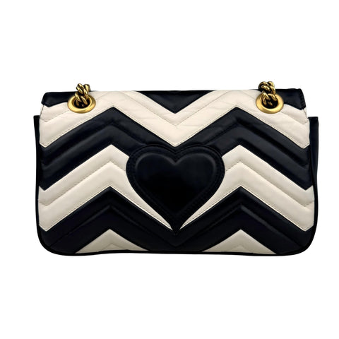 Gucci GG Marmont handbag in black and white quilted leather