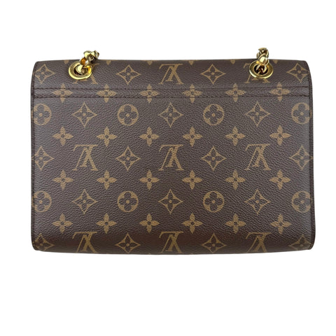 Louis Vuitton Victoire Handbag Monogram Canvas and Leather shoulder bag