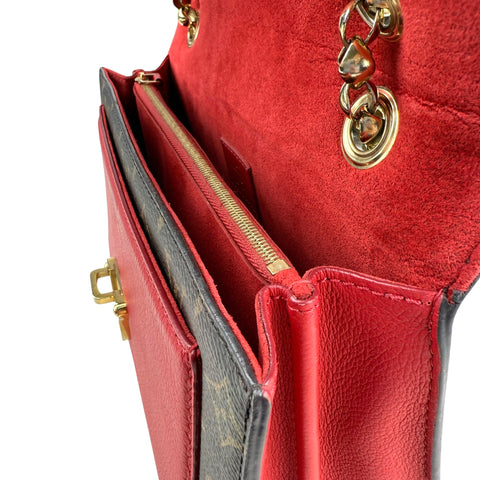 Louis Vuitton Victoire Handbag Monogram Canvas and Leather shoulder bag