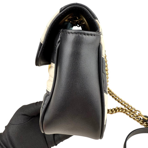 Gucci GG Marmont handbag in black and white quilted leather