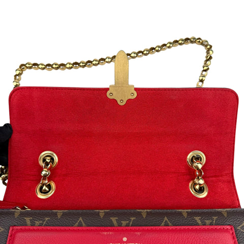 Louis Vuitton Victoire Handbag Monogram Canvas and Leather shoulder bag