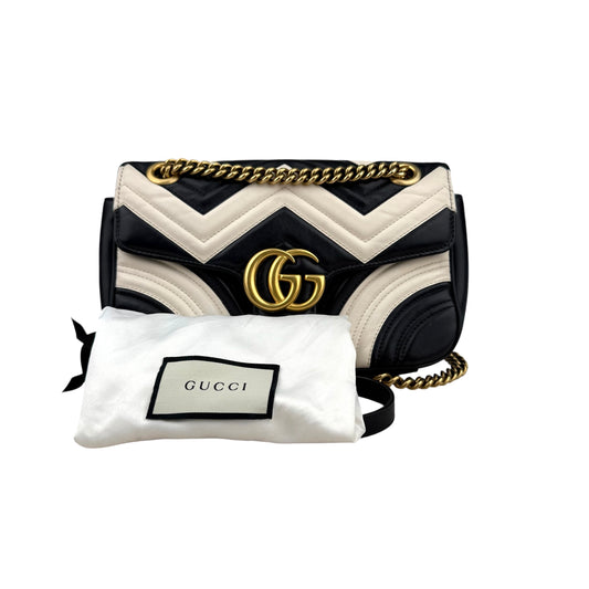 Gucci GG Marmont handbag in black and white quilted leather