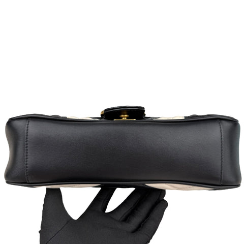 Gucci GG Marmont handbag in black and white quilted leather