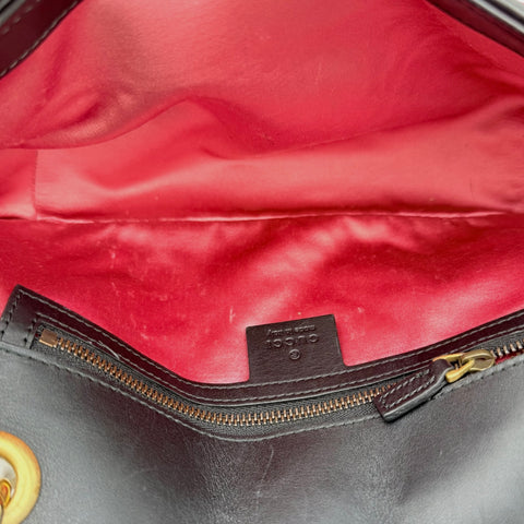 Gucci GG Marmont handbag in black and white quilted leather