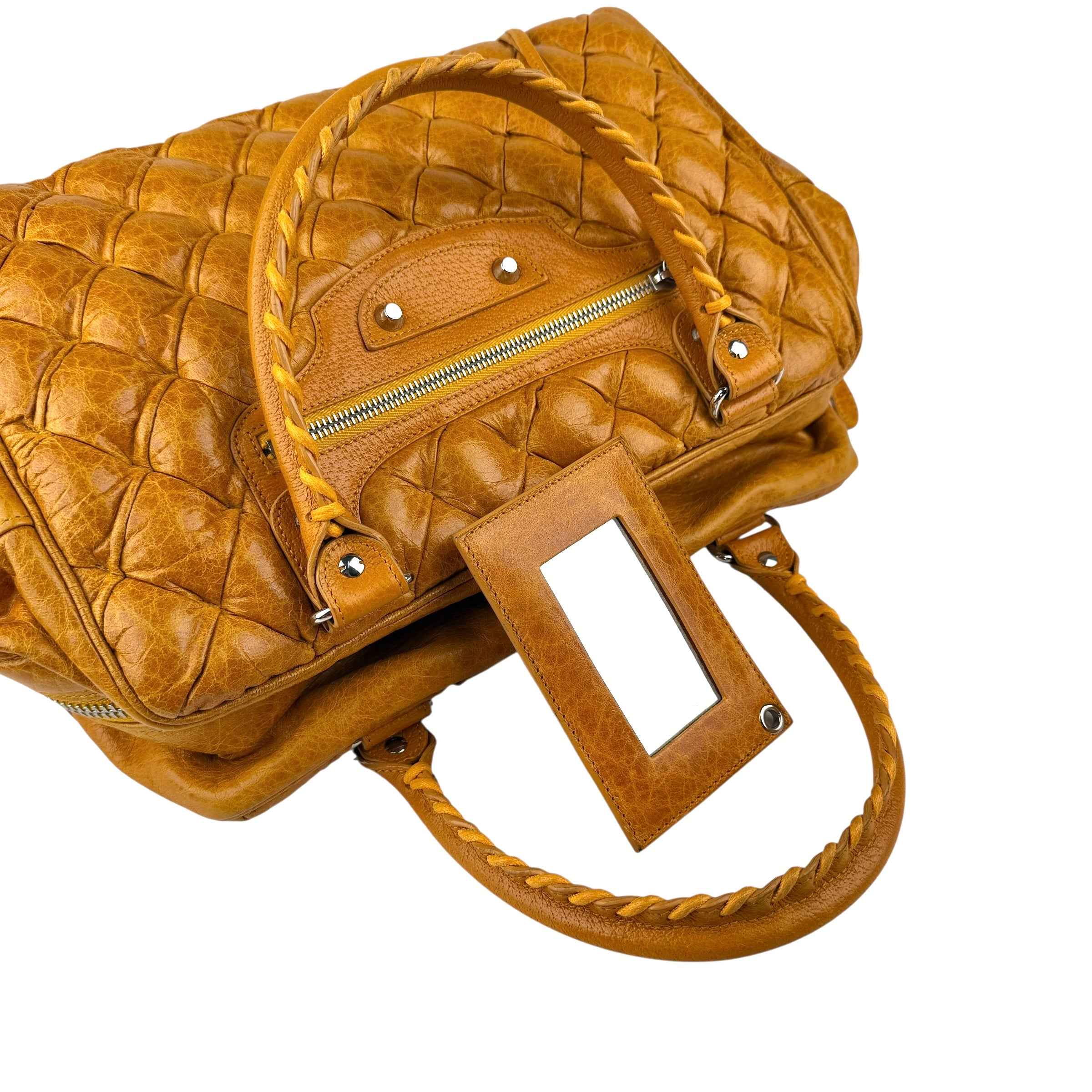 balenciaga quilted mustard yellow leather matelasse handbag handle detail