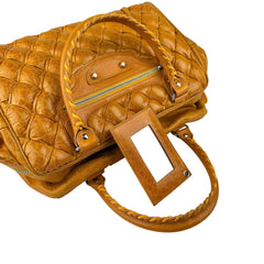 balenciaga quilted mustard yellow leather matelasse handbag handle detail