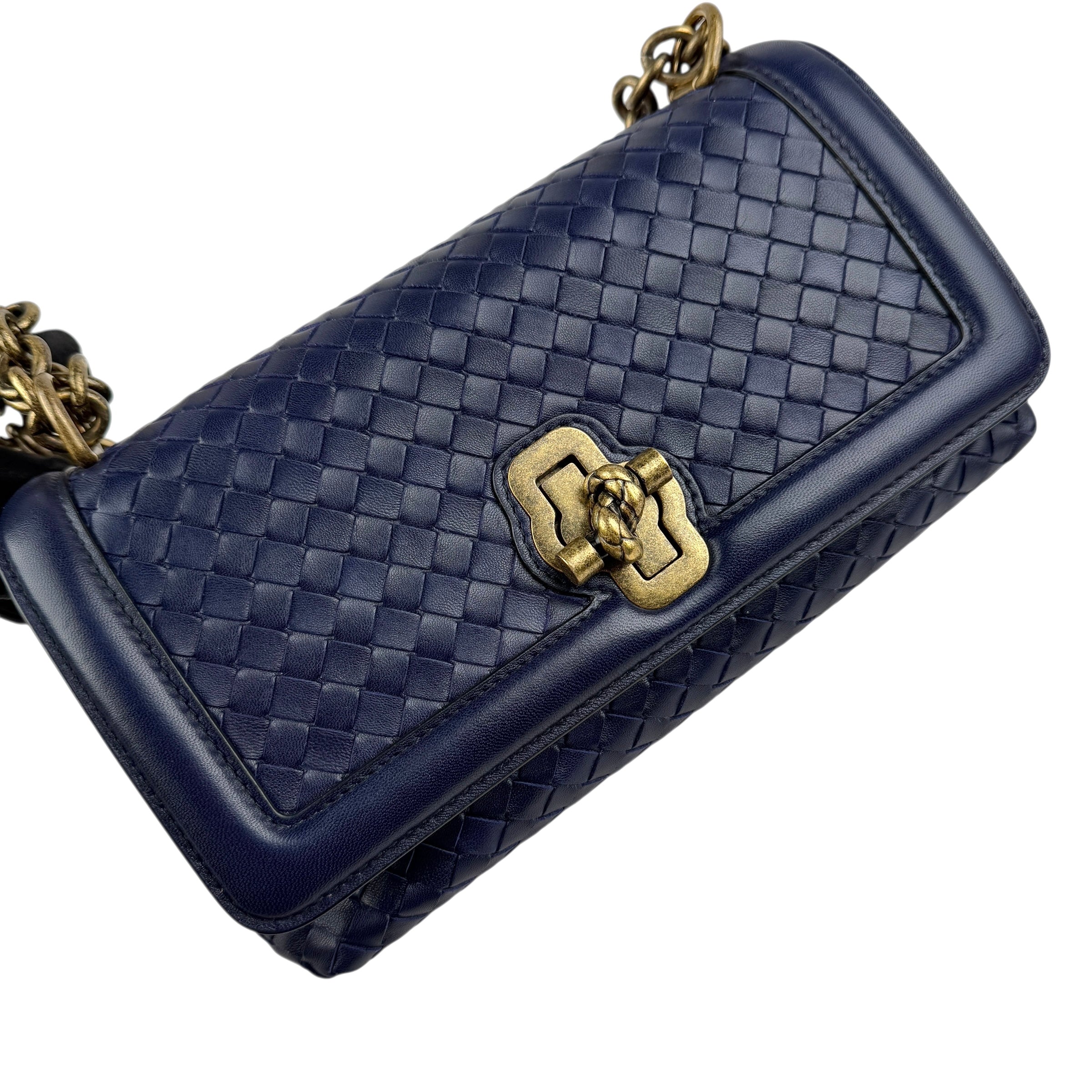 bottega veneta blue quilted leather olimpia knot shoulder bag left front 45