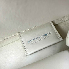 bottega veneta calfskin the point triangle bag chalk inside pocket detail