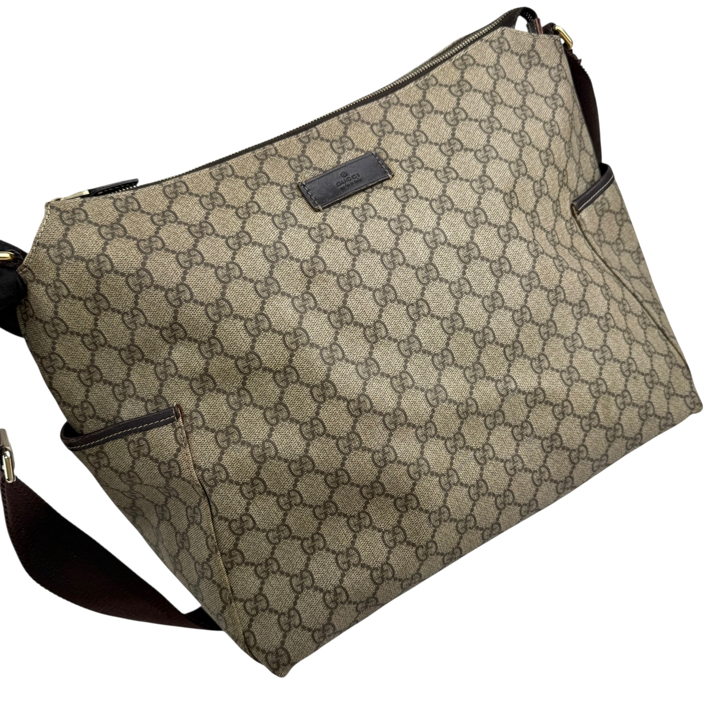 gucci beige gg supreme coated canvas baby diaper bag left front 45