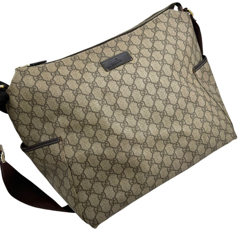 gucci beige gg supreme coated canvas baby diaper bag left front 45