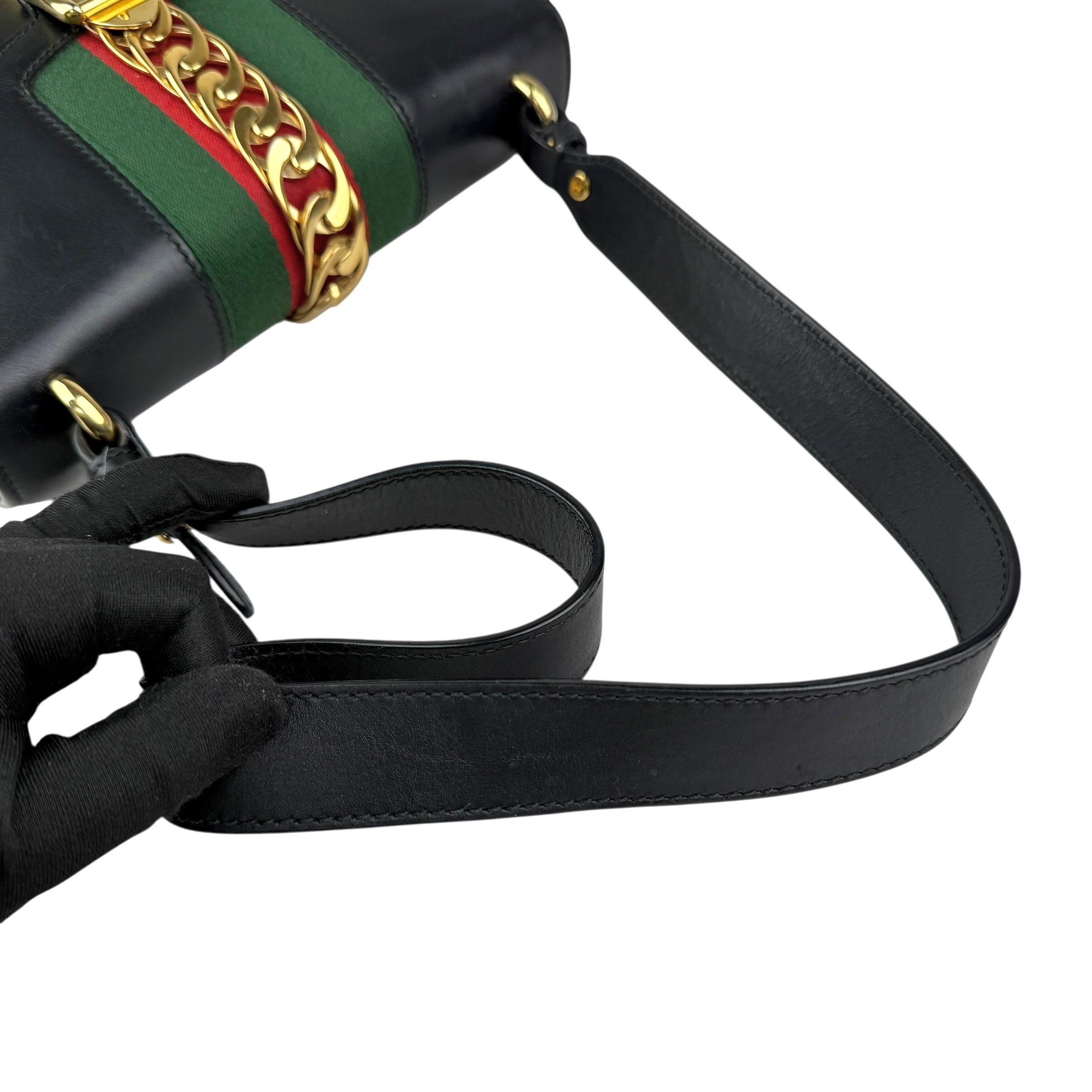 gucci black leather web sylvie shoulder bag handle detail