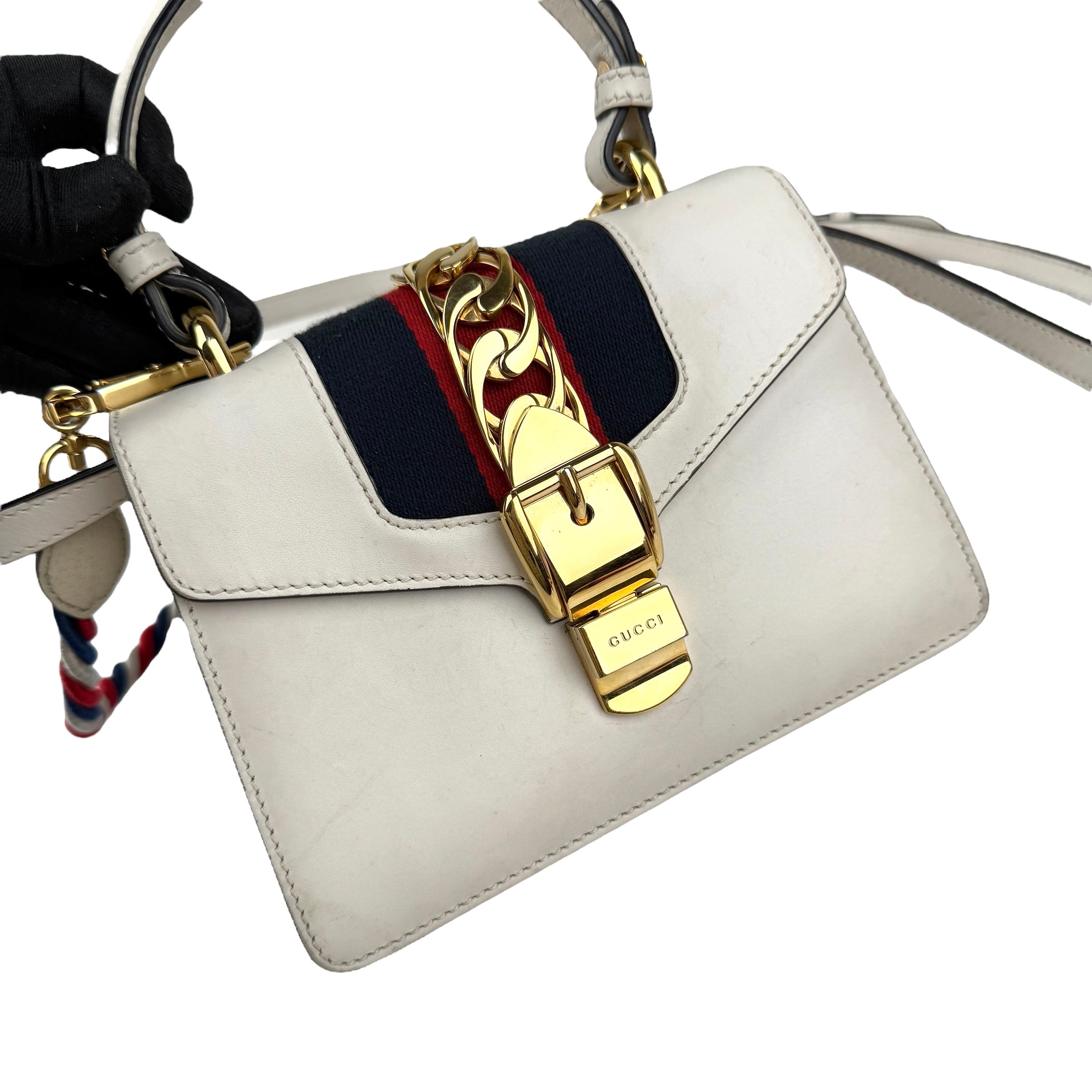 gucci calfskin mini sylvie top handle bag white hardware detail
