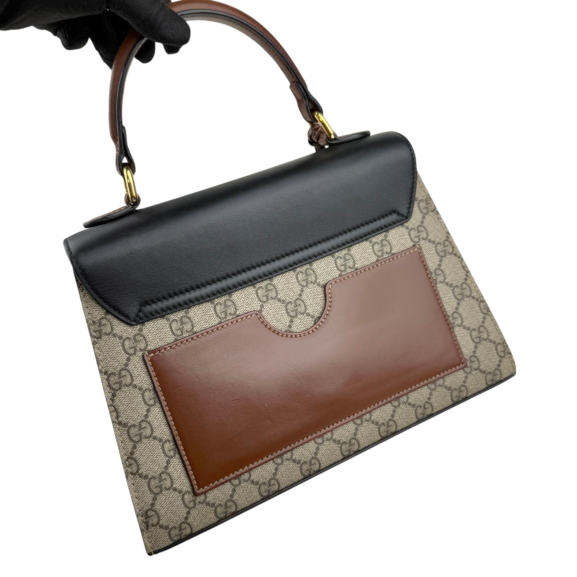 gucci gg supreme monogram calfskin padlock top handle bag left back 45
