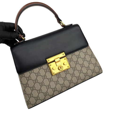 gucci gg supreme monogram calfskin padlock top handle bag left front 45