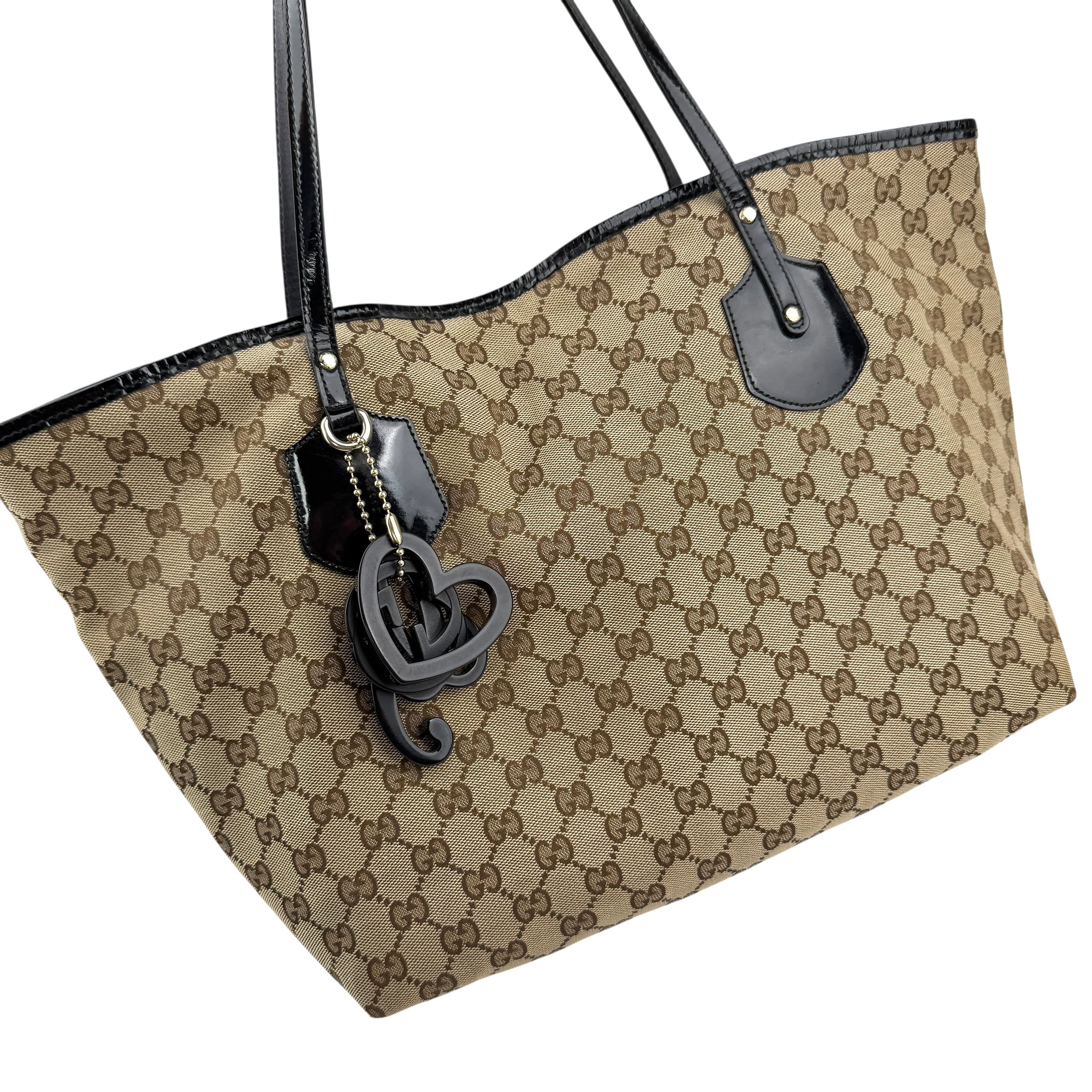 gucci medium gg canvas jolie tote brown left front 45