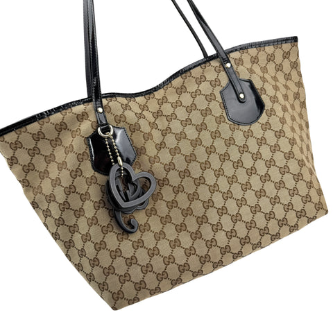 gucci medium gg canvas jolie tote brown left front 45