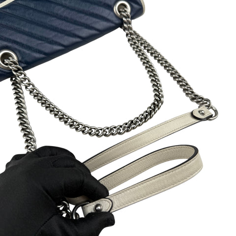 gucci navy and white gg marmont shoulder bag handle detail