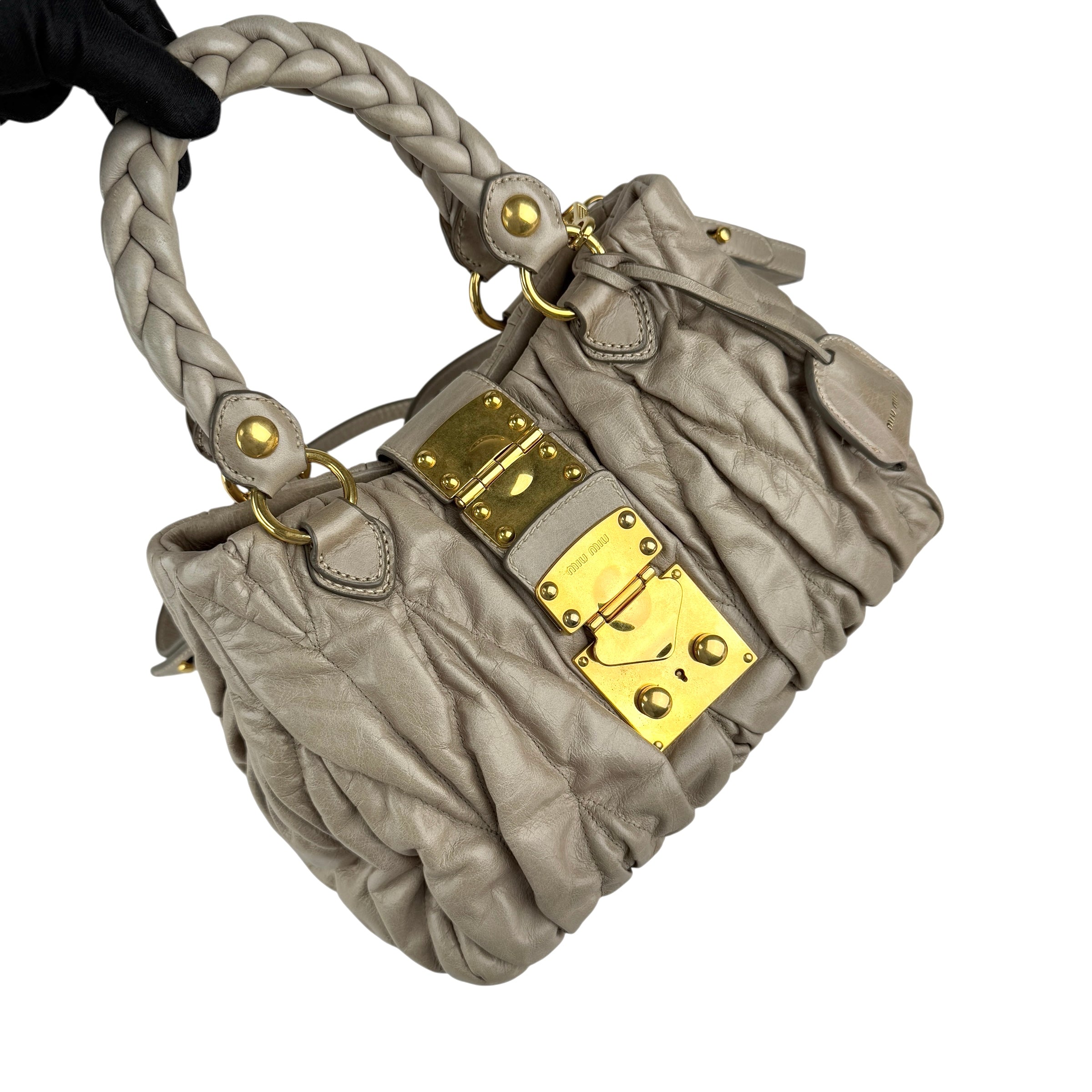 miu miu matelasse two-way handbag left front 45