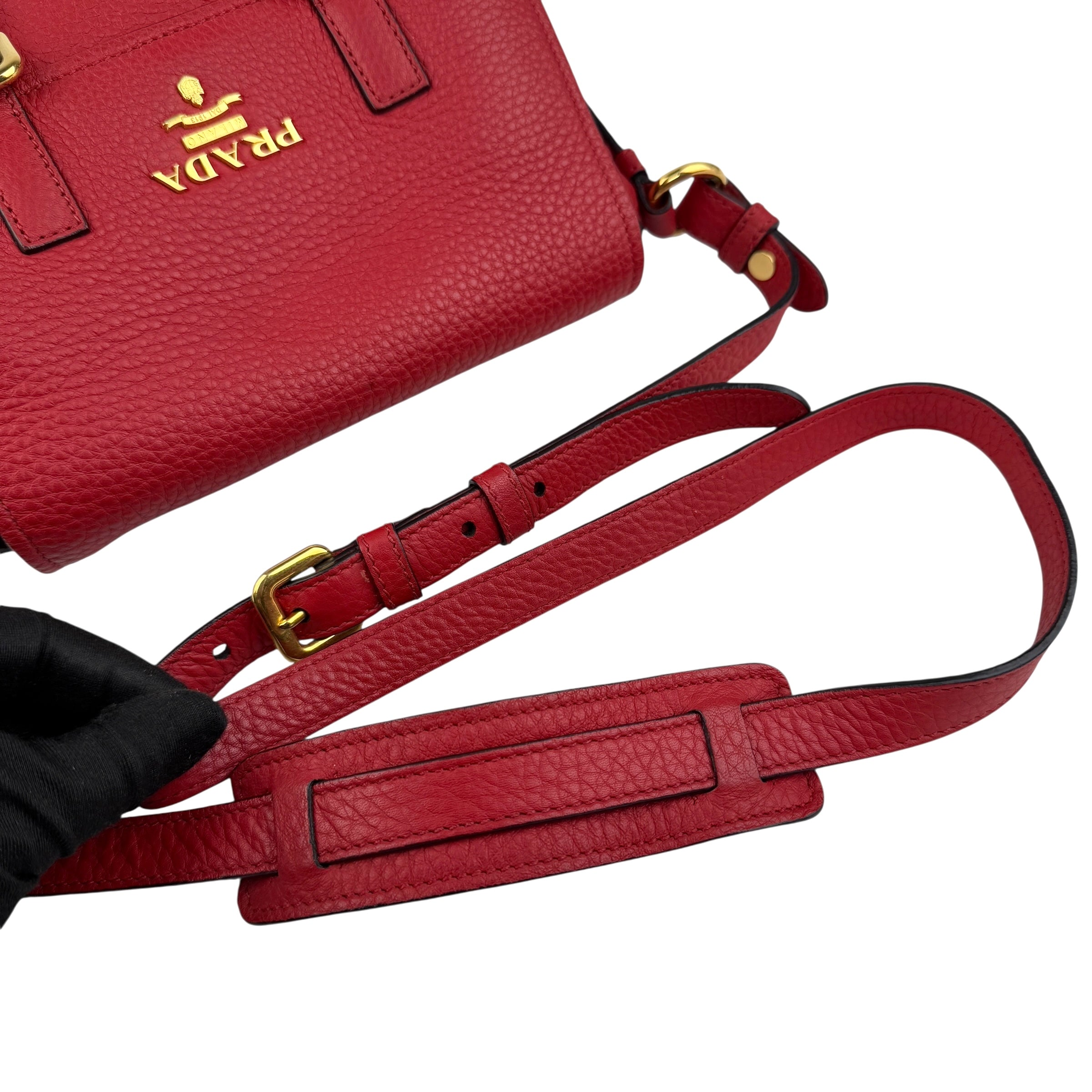 prada red leather buckle flap shoulder bag handle detail