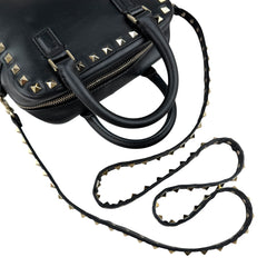 valentino black leather rockstud crossbody bag handle detail