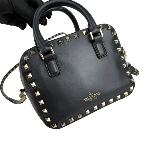 valentino black leather rockstud crossbody bag left front 45