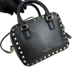 valentino black leather rockstud crossbody bag left front 45